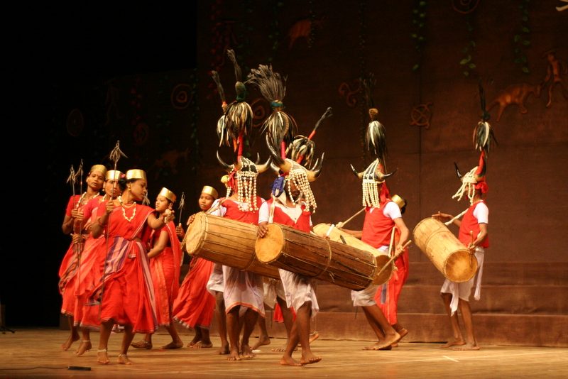Bison-horn Maria dancers of Bastar: men in horned headdresses with drums, women with spears